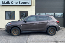 Brown 2019 Mitsubishi RVR with automotive window film